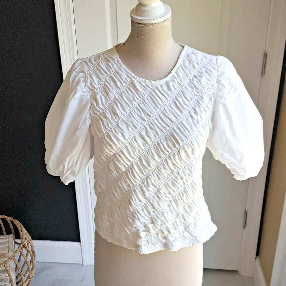 Anthropologie's PUFFY FRONT Puff SLEEVE BLOUSE